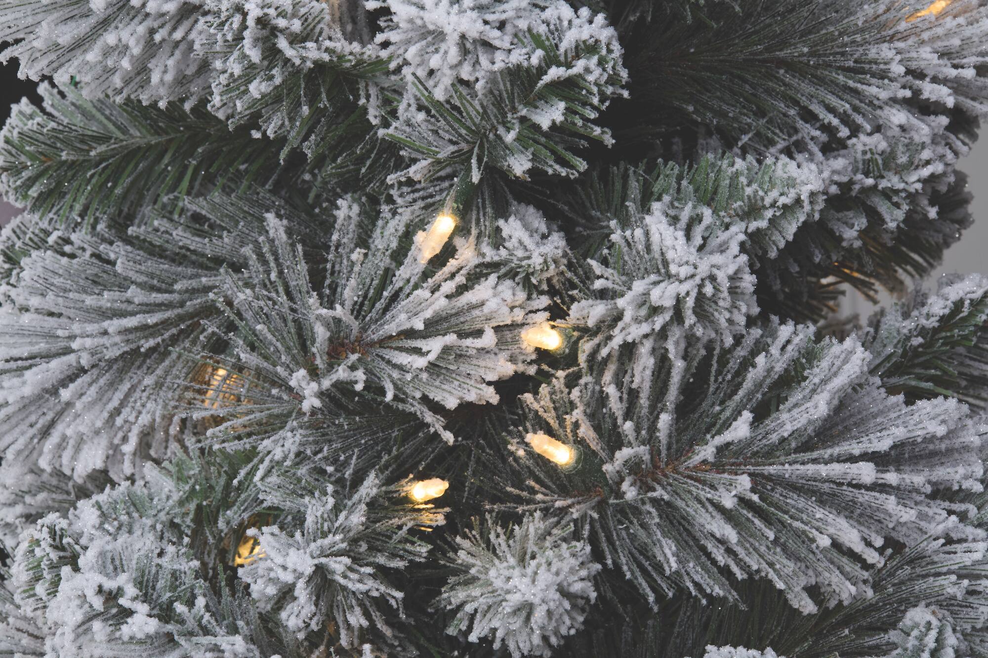 7ft. Pre-Lit Flocked Slim Artificial Christmas Tree, Warm White Twinkle LED Lights by Ashland®